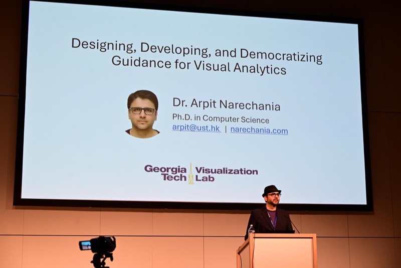 Arpit Narechania accepting the IEEE VGTC Visualization Dissertation Award at IEEE VIS 2025 in Vienna